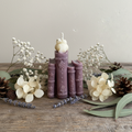 Book stack candle with dried flowers